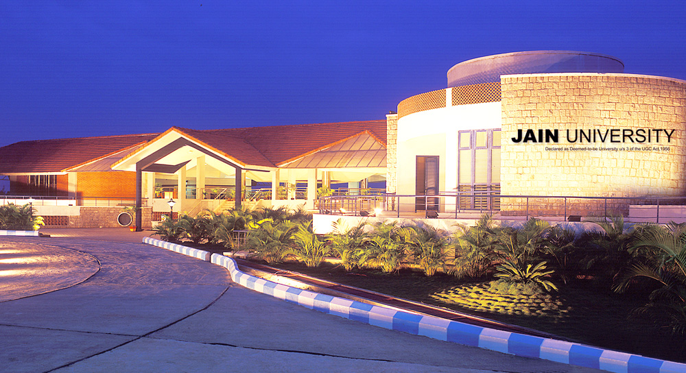 Jain University campus building at night
